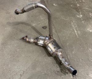 Diesel particulate filter and exhaust assembly removed from a vehicle for servicing